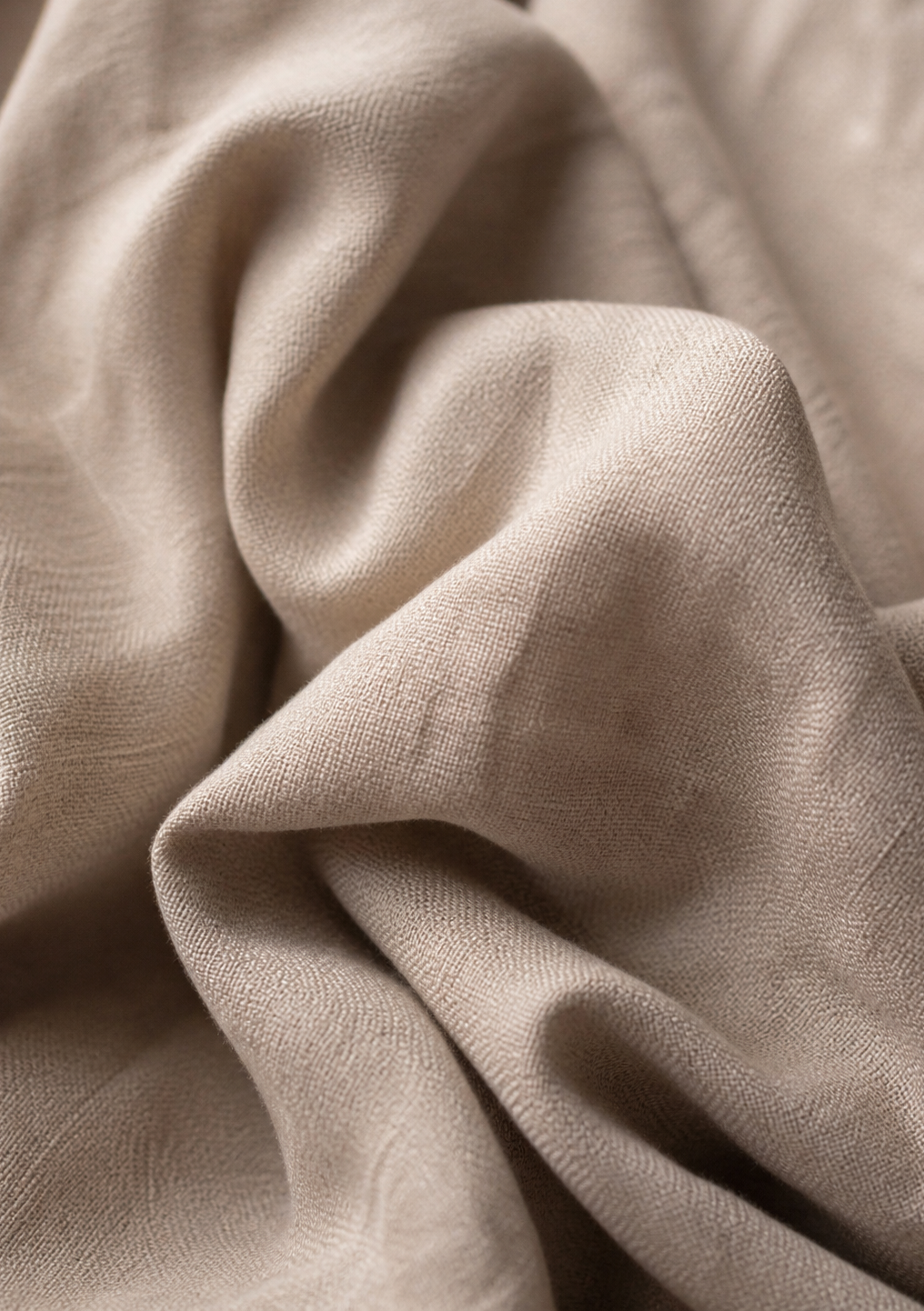 Folded fine linen, neutral tones